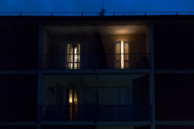 Low angle view of building against sky at night