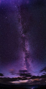 Low angle view of stars against sky at night