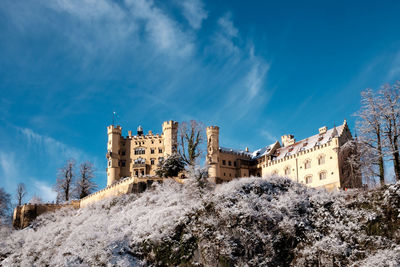 Low angle view of historic building in winter