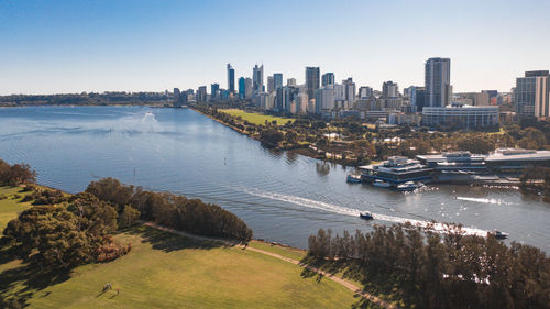 Aerial view of canal passing through city