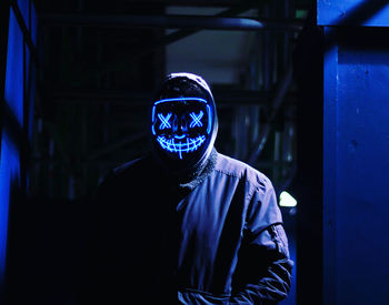 Rear view of man wearing mask