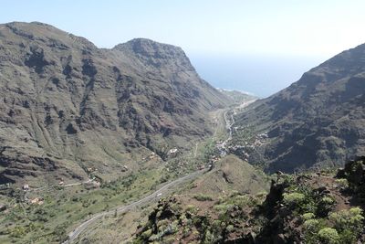 Scenic view of mountains against clear sky