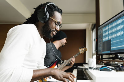 Men playing guitar