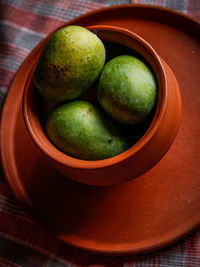 High angle view of fruits in bowl on table