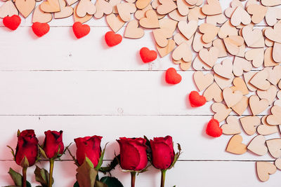 High angle view of red roses on table