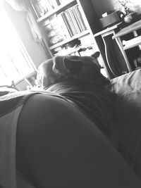 Close-up of people relaxing on wall