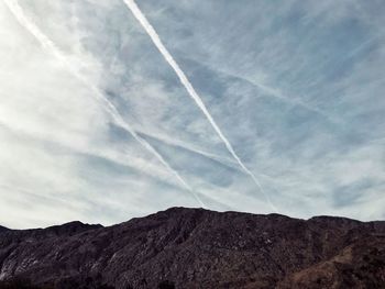 Low angle view of vapor trail in sky