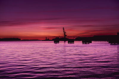 Scenic view of sea against sky at sunset