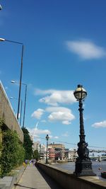Road in city against sky