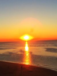 Scenic view of sea at sunset