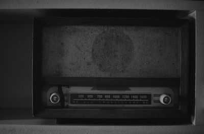 Close-up of telephone on table at home