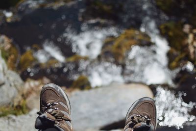 Low section of man over water