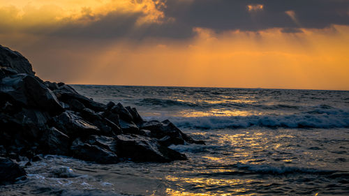 Scenic view of sea at sunset