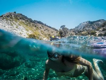 Scenic view of sea against blue sky