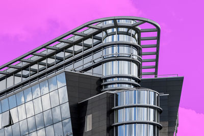 Low angle view of modern building against sky