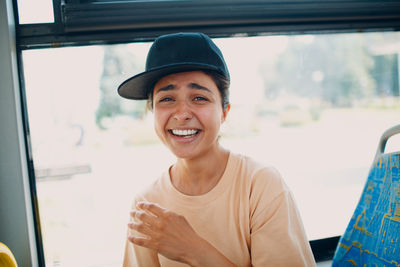 Portrait of smiling man in car