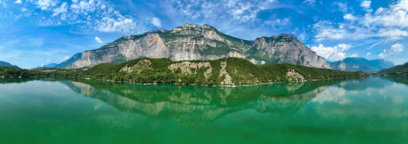 Panoramic view of lake against cloudy sky