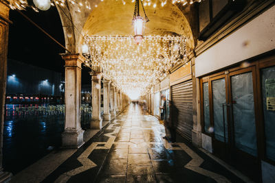 Illuminated corridor of building