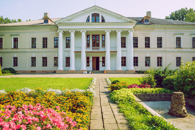 View of lawn with building in background