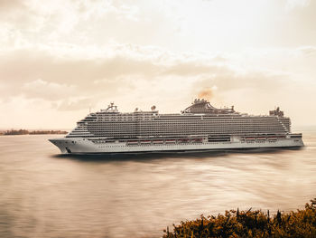 Golden hour large cruise ship landscape from the caribbean puerto rico coast in san juan el morro