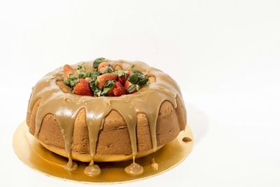 Close-up of homemade bundt cake with strawberries