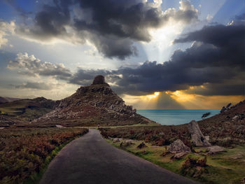 View of landscape against cloudy sky