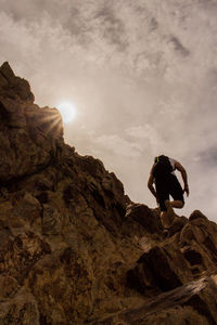 Rock formation on mountain against sky