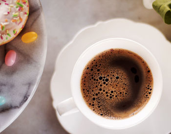 High angle view of coffee cup on table