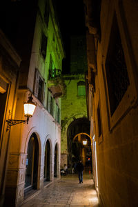 People walking in front of building