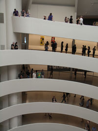 High angle view of people sitting on steps