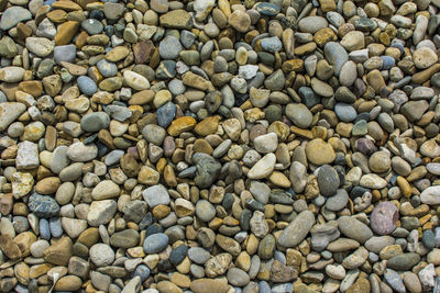 Full frame shot of pebbles on beach