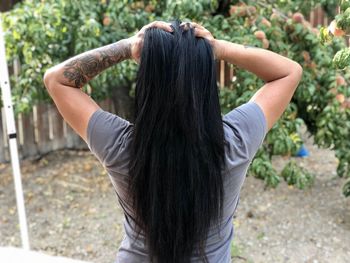 Healthy long hair after a trim with layers. 