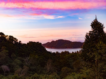 Scenic view of mountains against sky at sunset