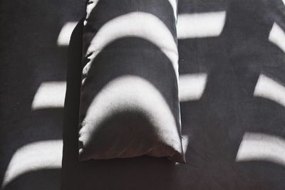 Sunlight falling on pillow and bed