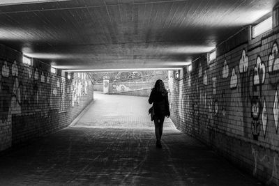 People walking in tunnel