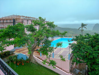 High angle view of swimming pool against buildings