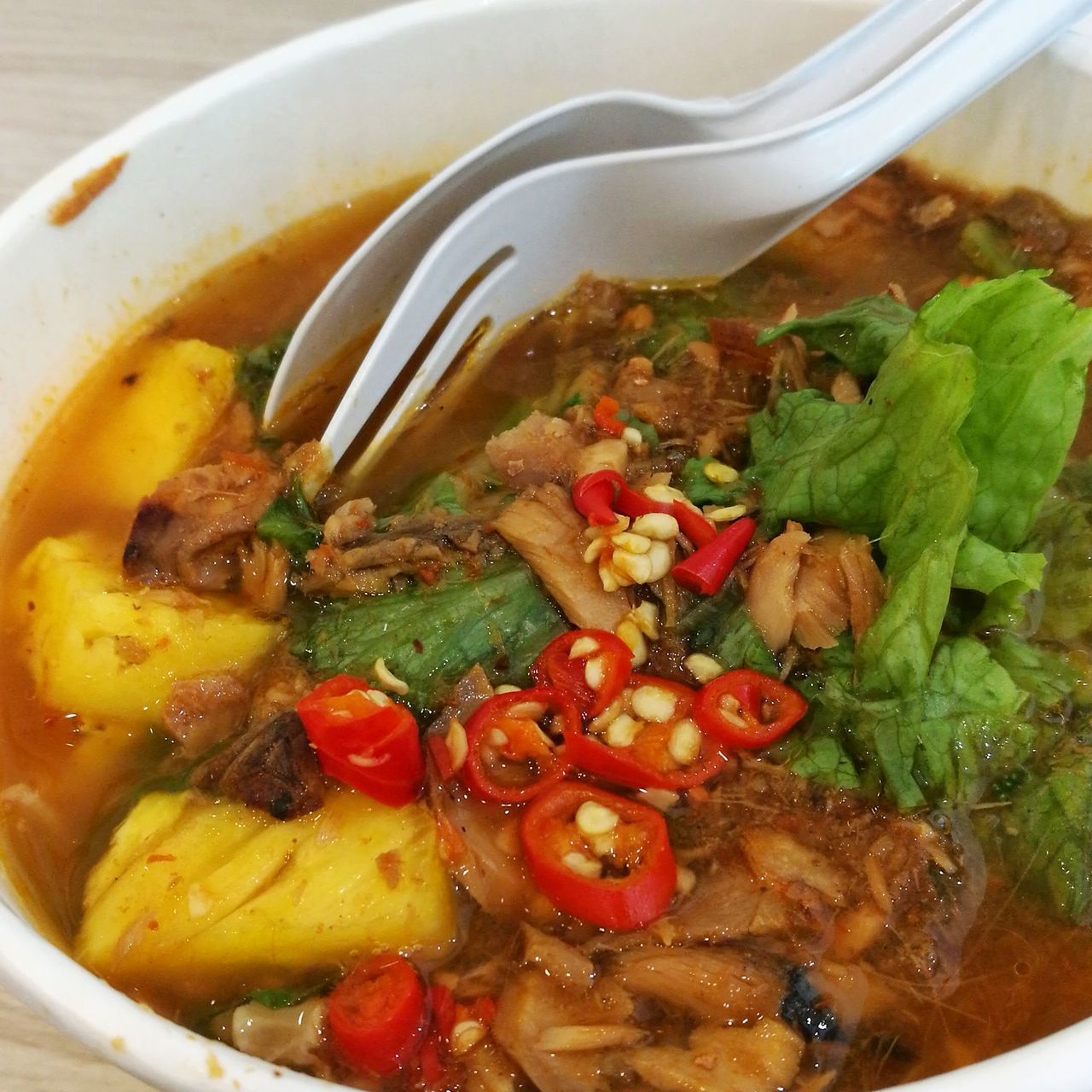 CLOSE-UP OF MEAT WITH VEGETABLES