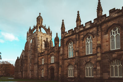 Low angle view of historic building against sky