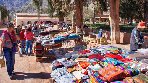 Group of people at market stall