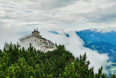 Panoramic view of building and trees against sky, eagles nest, berchtesgaden, germany