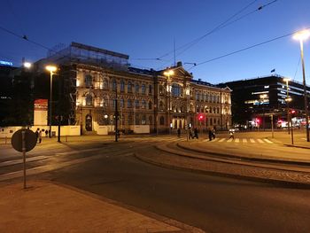 Illuminated street light at night