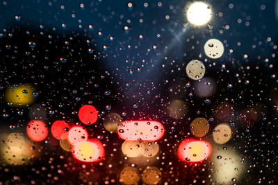 Close-up of raindrops on glass window