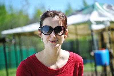 Close-up of young woman wearing sunglasses