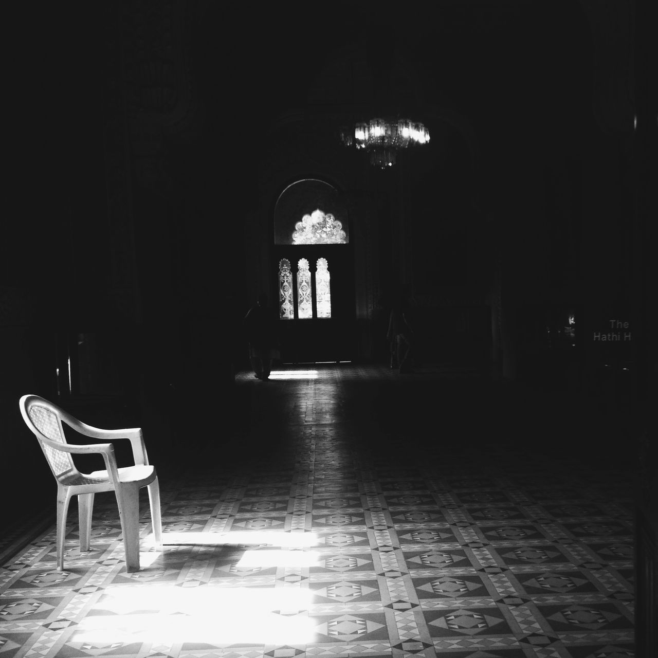 indoors, chair, empty, architecture, arch, built structure, absence, bench, flooring, corridor, entrance, door, tiled floor, sunlight, day, architectural column, cobblestone, window, table, house