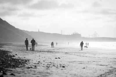 People walking on a beach