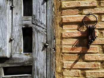 Closed wooden door of old house