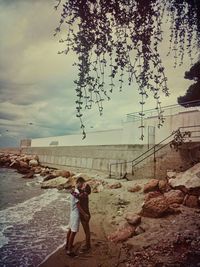 Woman standing on beach