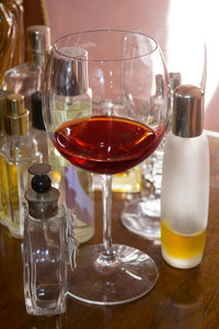 Close-up of wine glasses on table