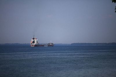 Boats sailing in sea