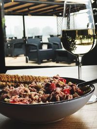 Close-up of food and wine on table